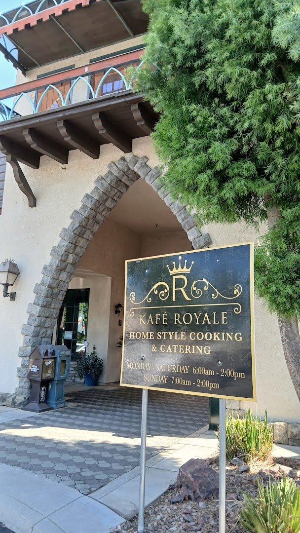 Warm storefront view of Kafe Royale Restaurant.
